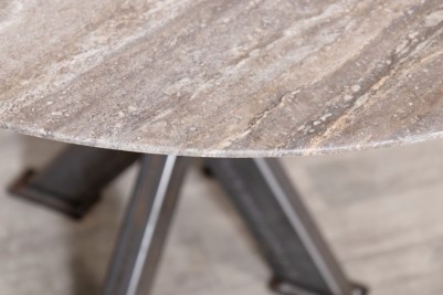 round-travertine-top-table-gunmetal-tank-trap-base